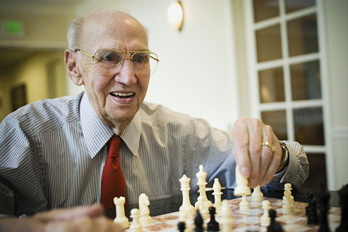 senior - man playing chess